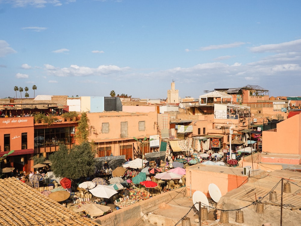 Rooftops over a medina square at golden hour